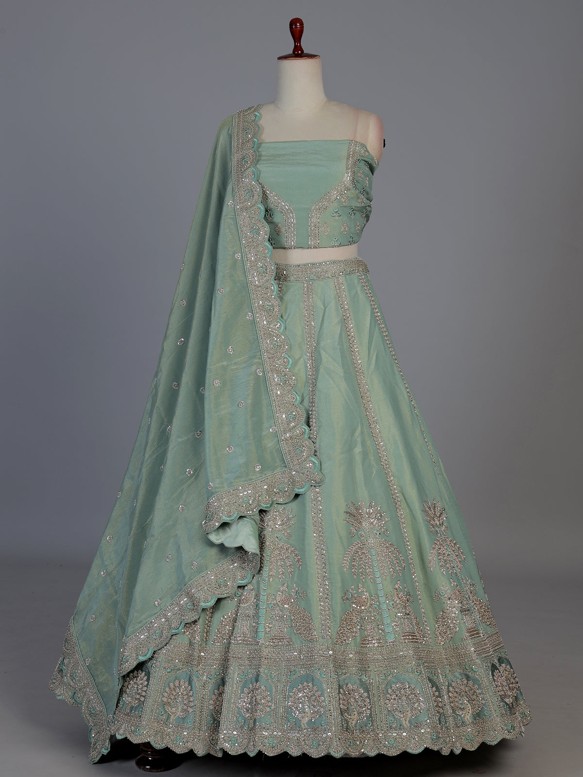 Sea green silk peacock motif unstitched lehenga choli with dupatta
