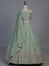 Sea green silk peacock motif unstitched lehenga choli with dupatta