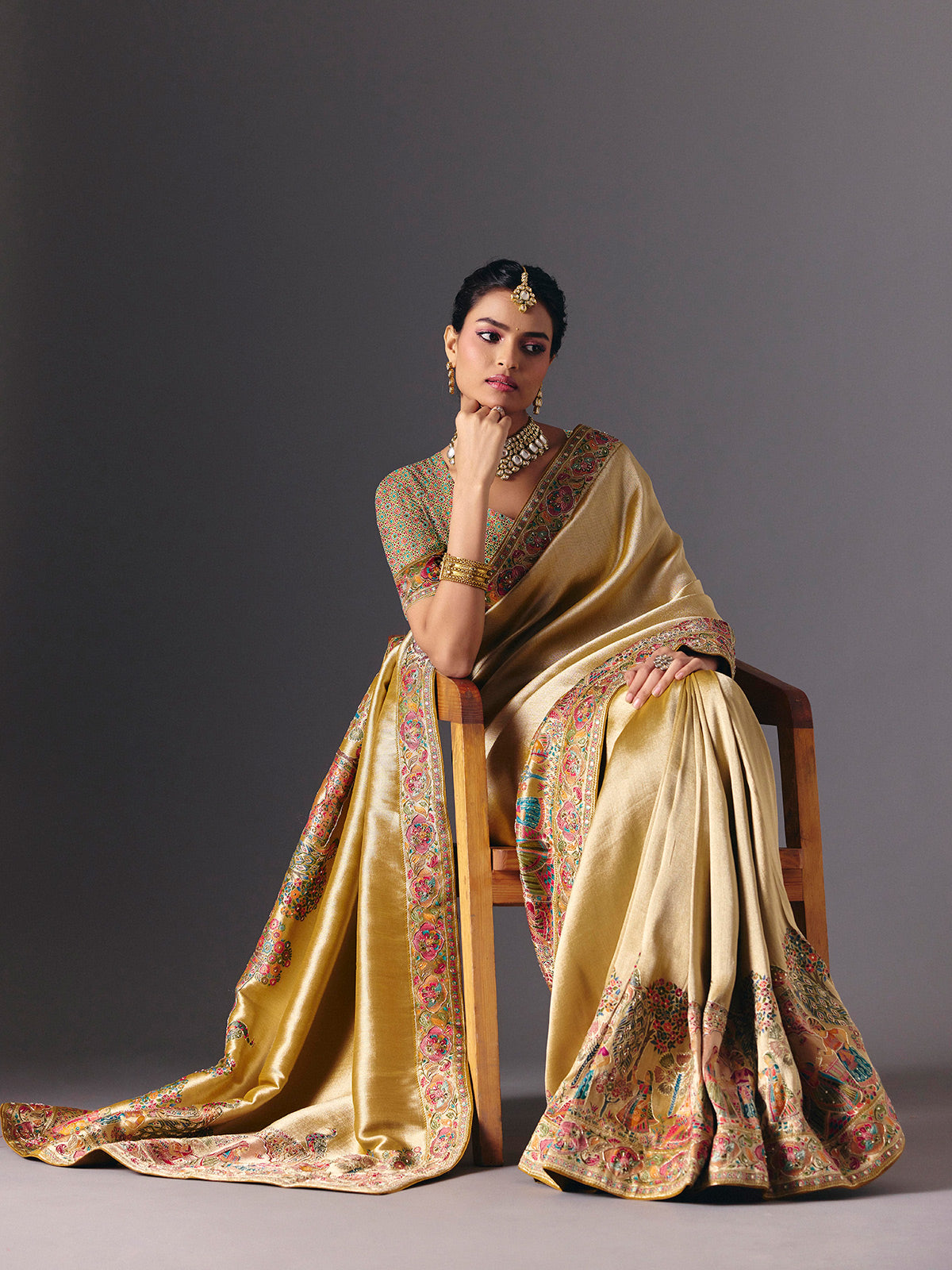 Gold tissue silk bridal saree with luxurious zardosi zari work