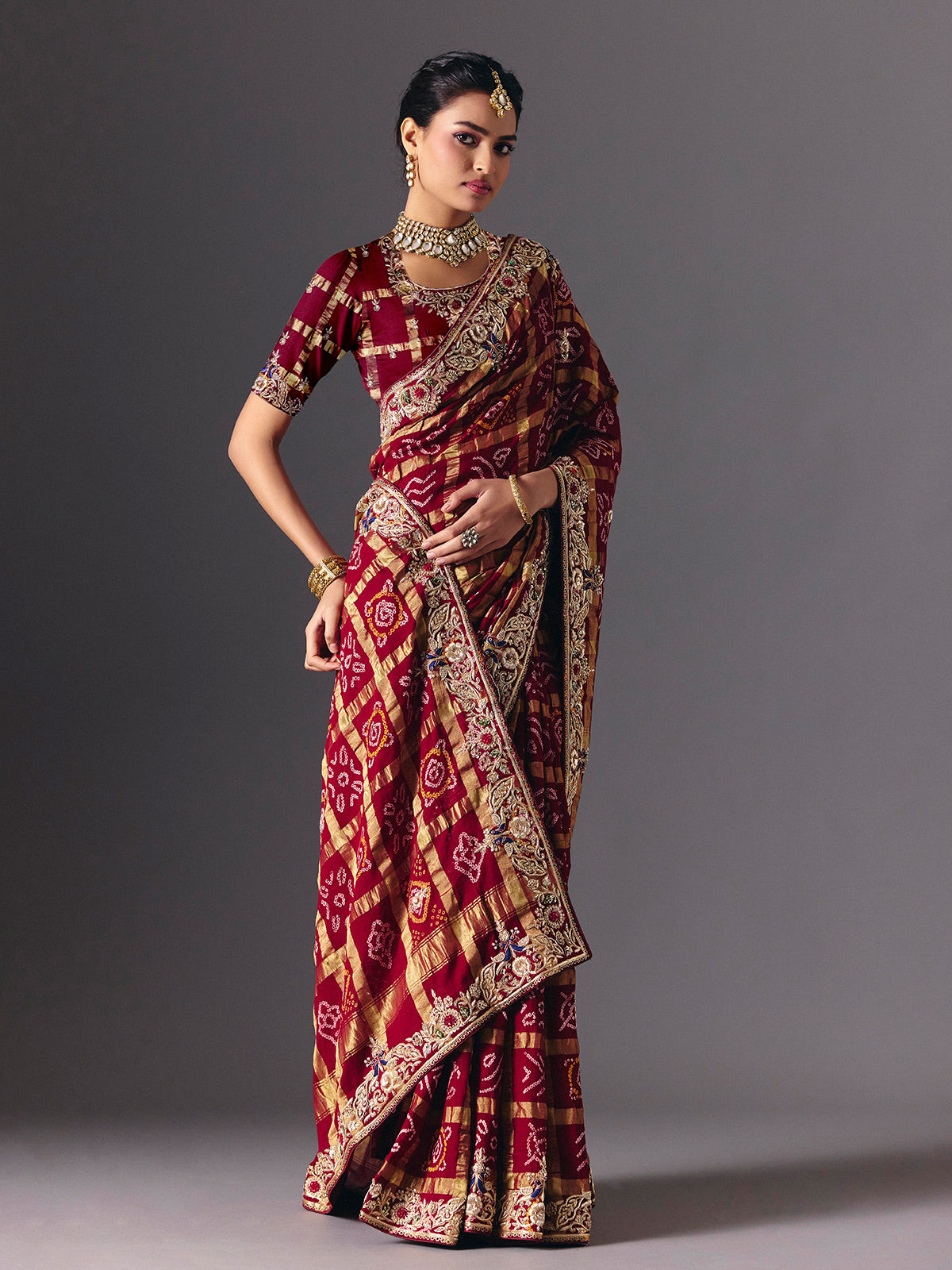 Maroon pure gharchola silk Bandhani saree with bridal zari elegance