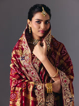 Maroon pure gharchola silk Bandhani saree with bridal zari elegance