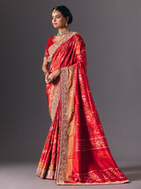 Red Hyderabadi patola silk saree with luxurious printed bridal artistry