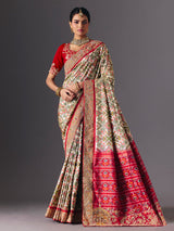 Cream Hyderabadi patola silk saree with elegant festive zari detailing