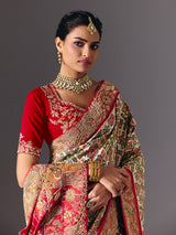 Cream Hyderabadi patola silk saree with elegant festive zari detailing