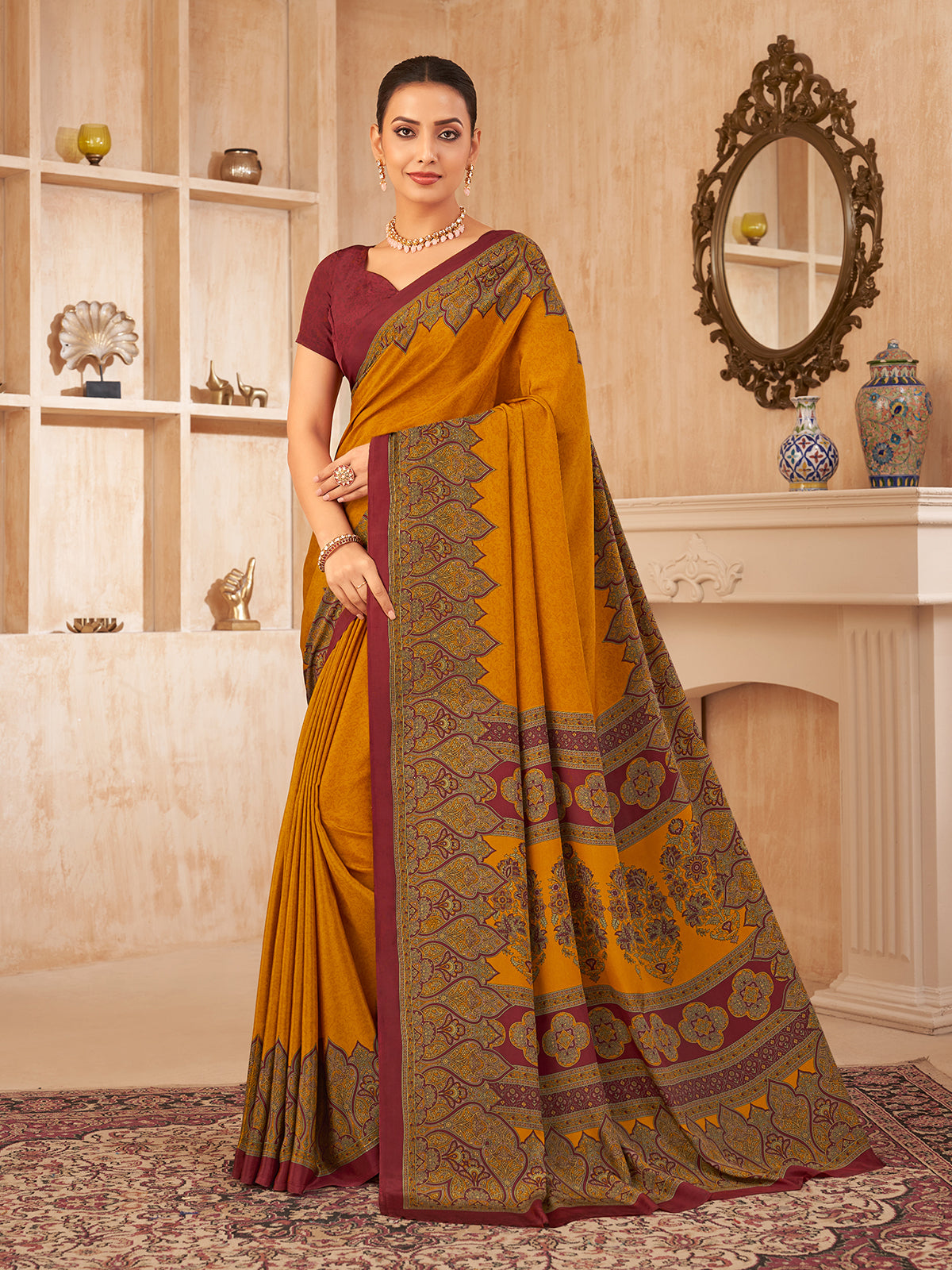 Mustard yellow printed contrast border crepe silk saree