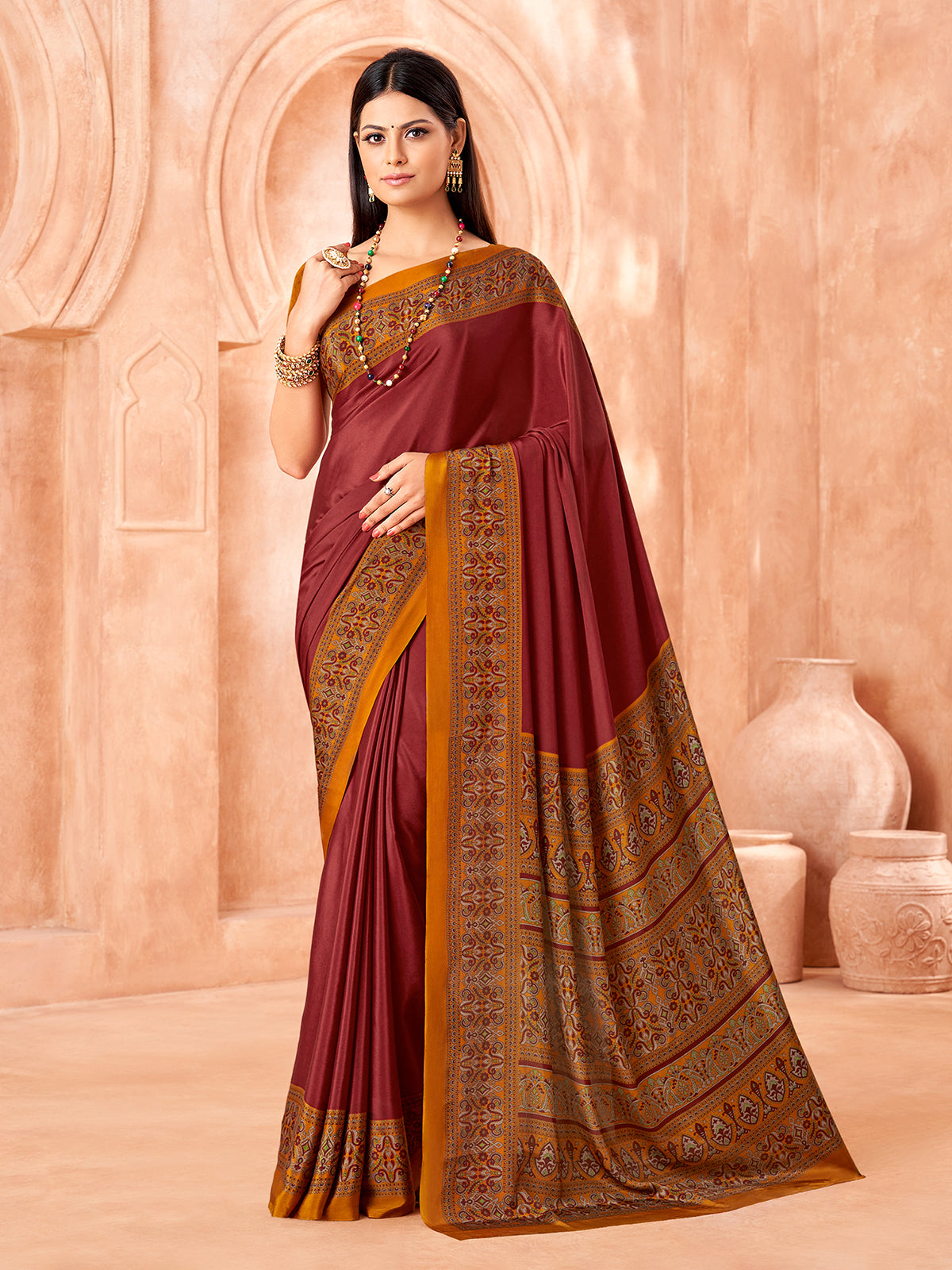 Brown printed contrast border and pallu crepe silk saree