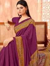 Purple printed contrast border crepe silk saree