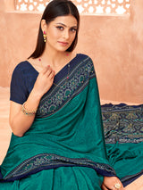 Rama green printed contrast border and pallu crepe silk saree