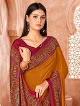 Mustard yellow printed contrast border and pallu crepe silk saree