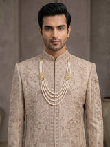Beige royal embroidered mens wedding sherwani