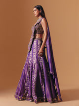 Purple designer silk lehenga choli with attached dupatta elegance