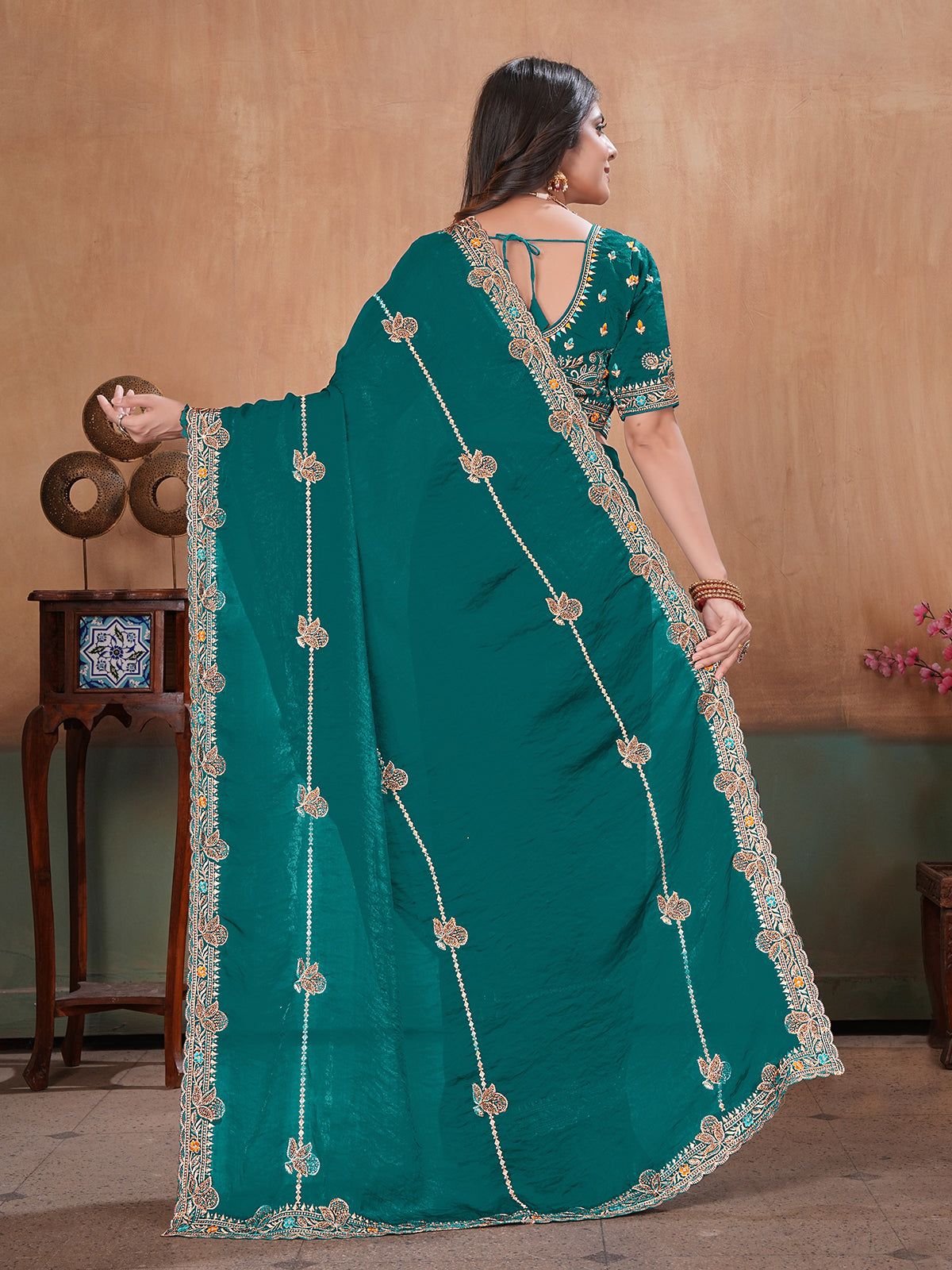 Green royal embellished satin saree with blouse