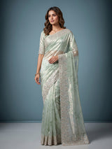 Pista green floral sequin tissue silk saree