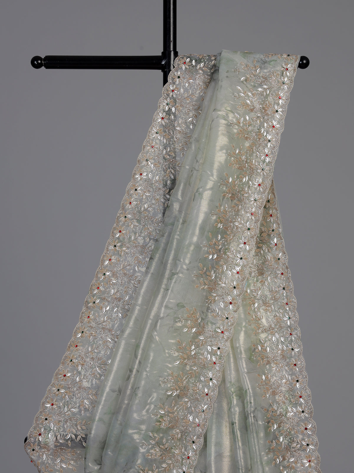 Pista green floral sequin tissue silk saree
