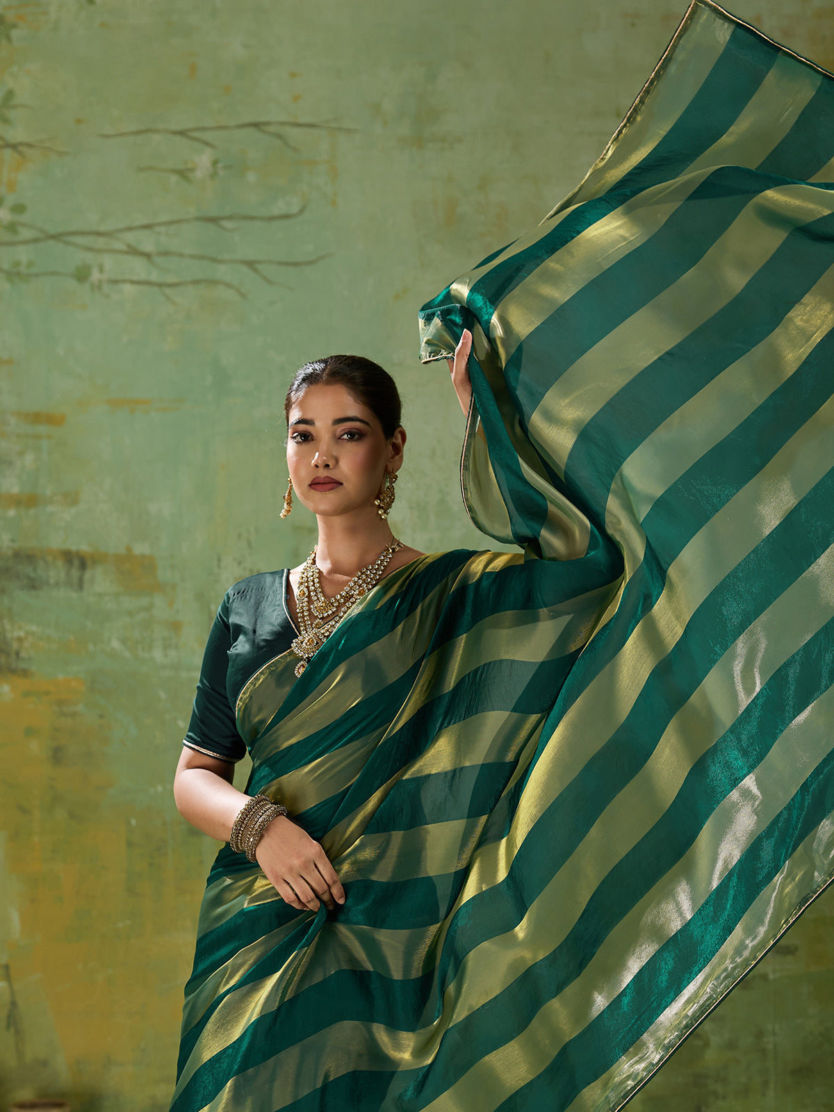 Graceful green festive satin saree for women