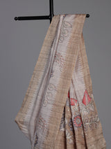 Beige art tusser silk saree with peacock floral motifs