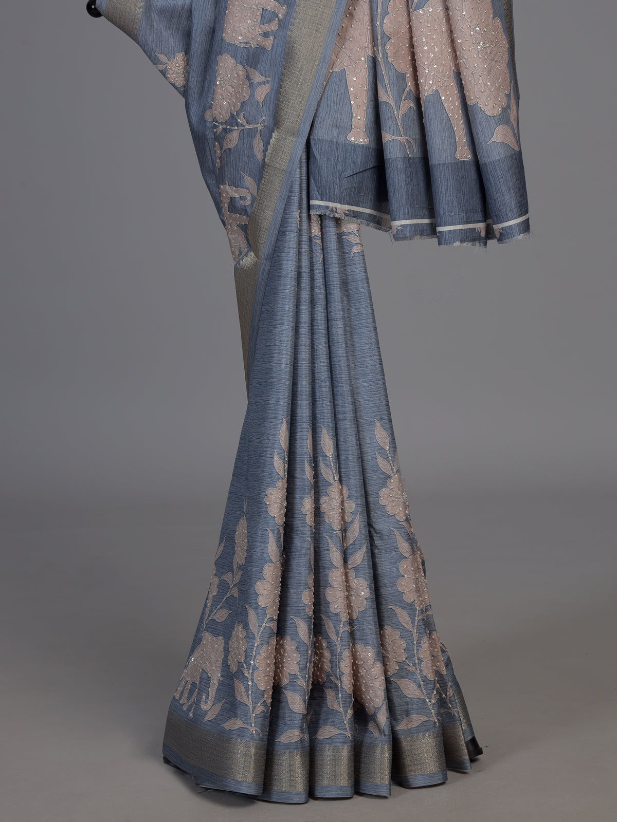Stone blue art silk saree with floral and elephant motif detailing