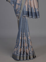 Stone blue art silk saree with floral and elephant motif detailing