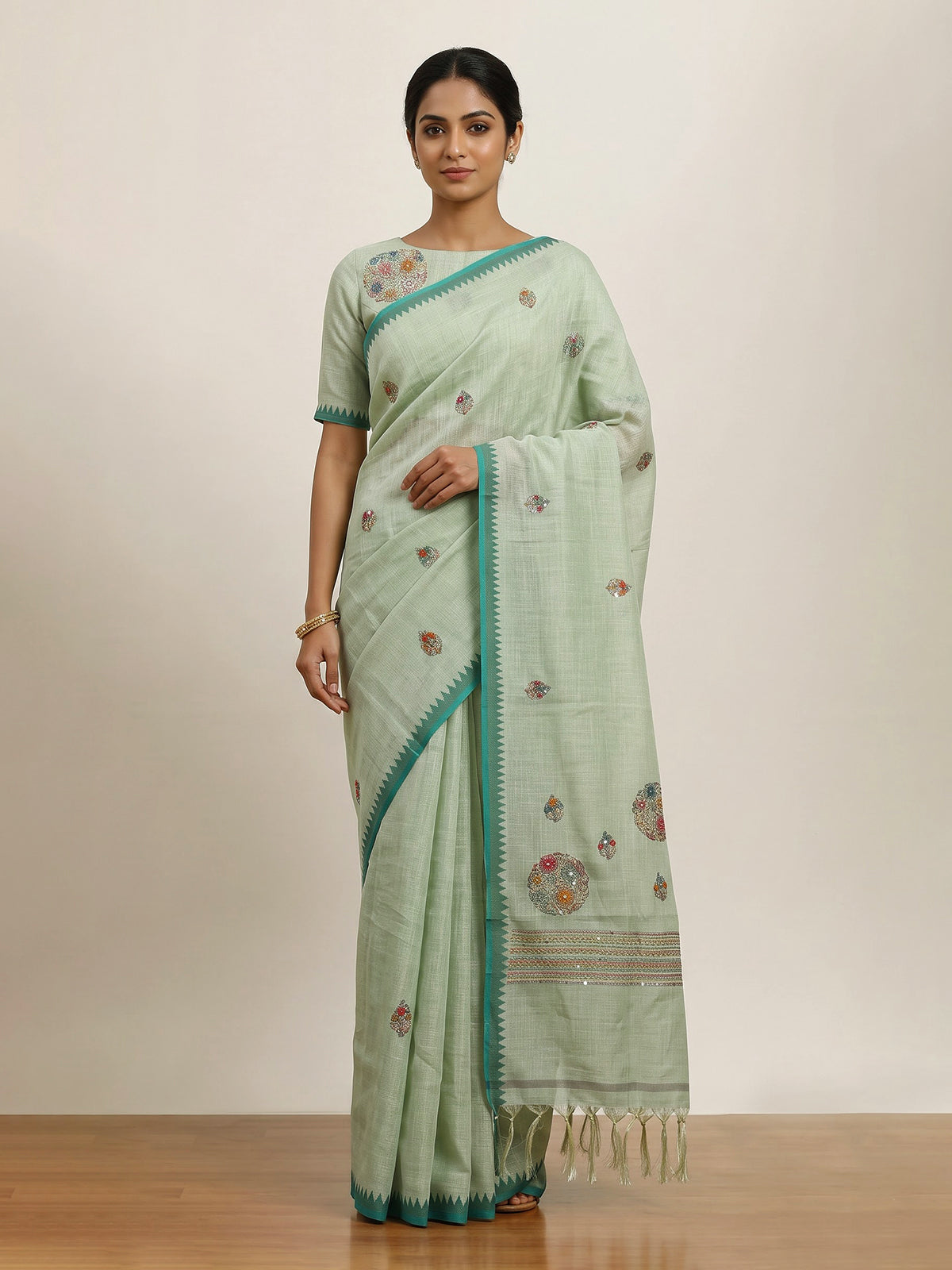 Pista green cotton silk saree with contrast border elegance