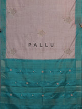 Beige tusser silk saree with regal zari border detailing