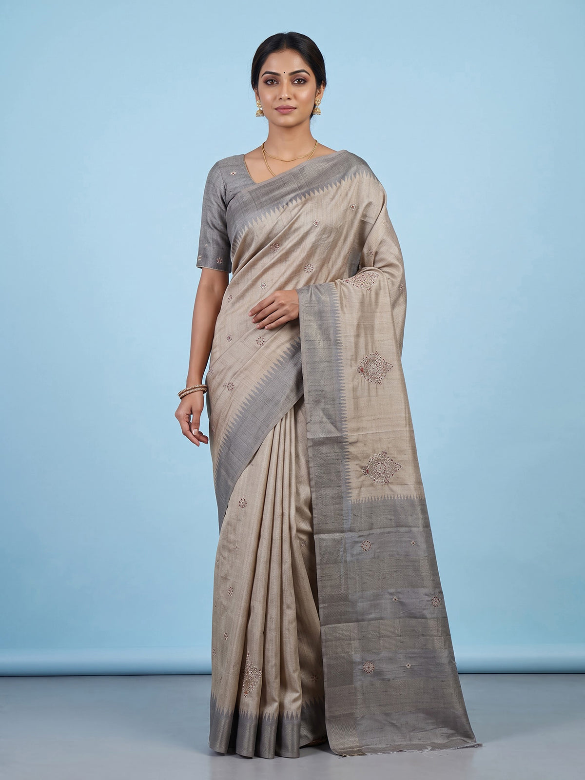 Pastel beige semi tusser silk saree with grey contrast border