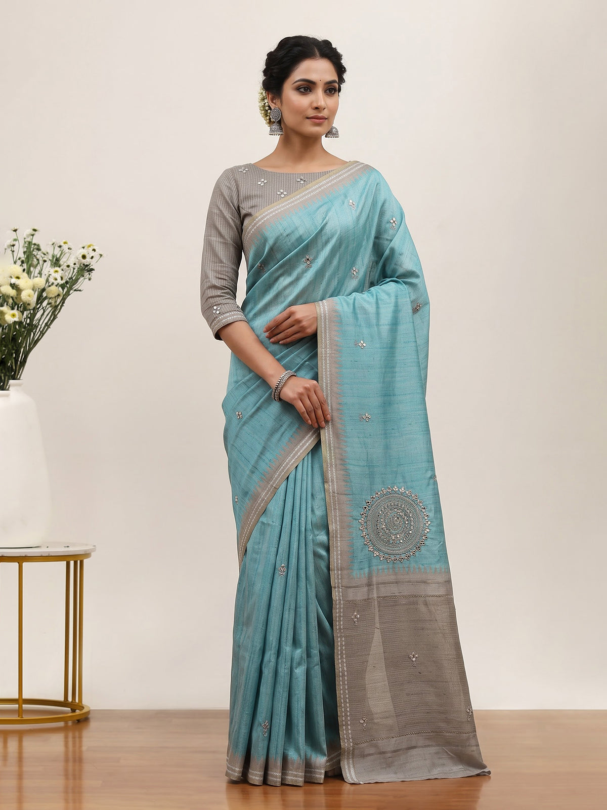 Sky blue semi tusser silk saree with rich zari embellishments