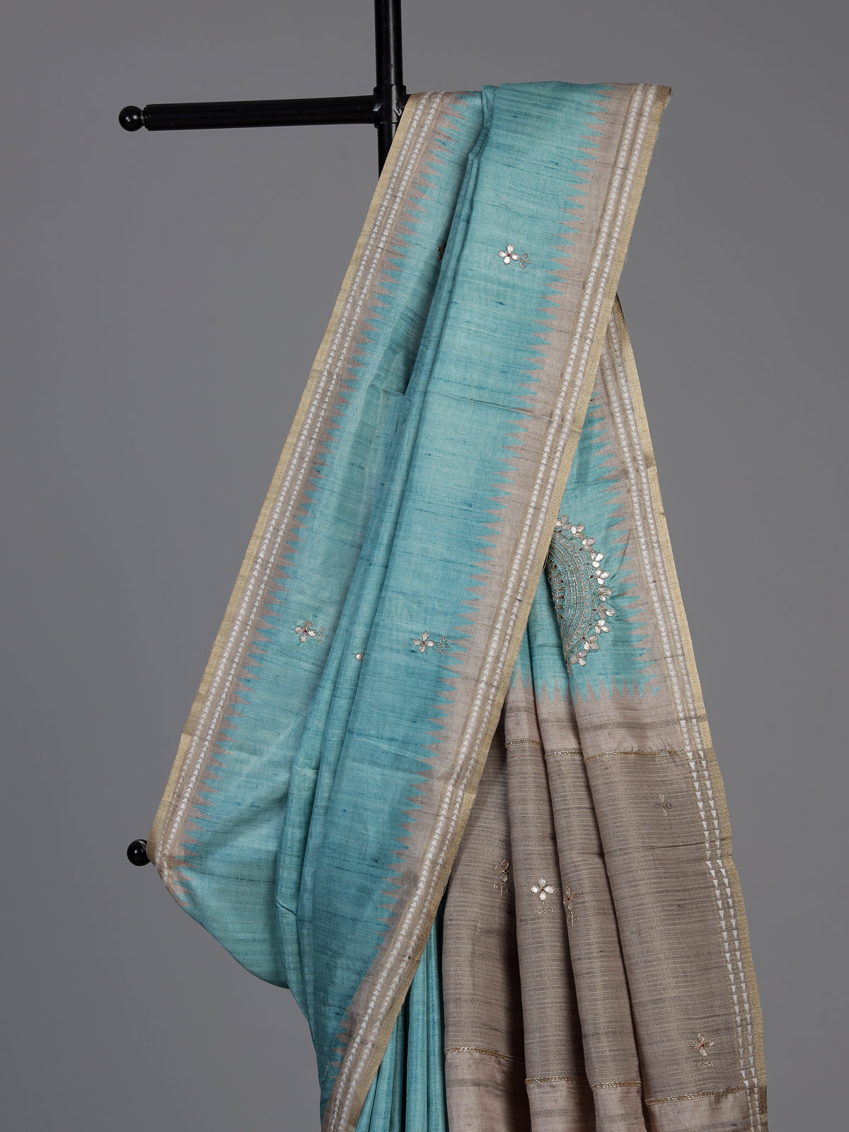 Sky blue semi tusser silk saree with rich zari embellishments