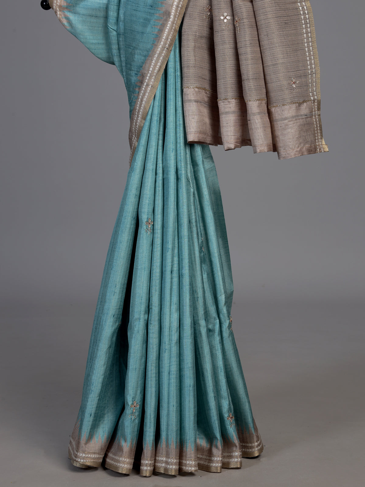Sky blue semi tusser silk saree with rich zari embellishments