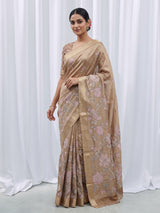 Pastel beige cotton silk saree with elegant bird motifs