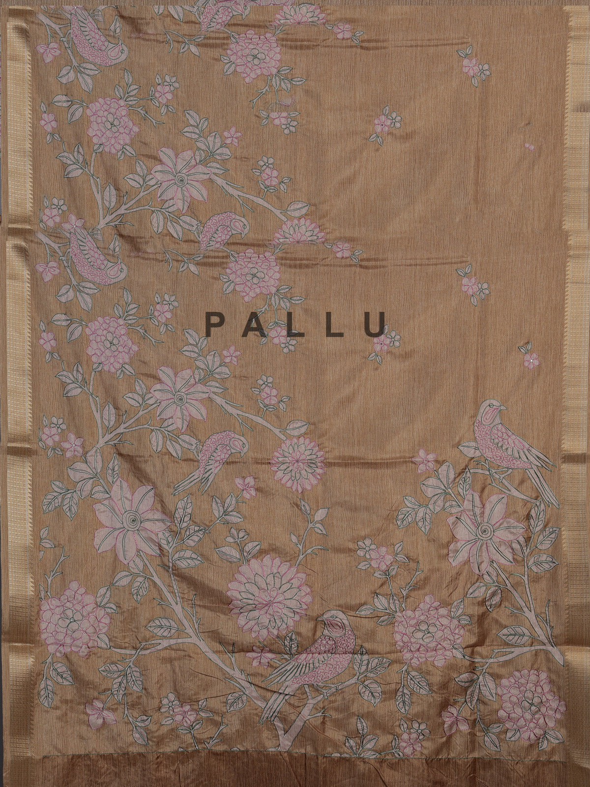 Pastel beige cotton silk saree with elegant bird motifs