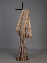 Pastel beige cotton silk saree with elegant bird motifs