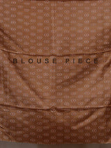 Beige and brown art tusser silk saree with floral bird detailing