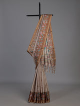 Beige and brown art tusser silk saree with floral bird detailing