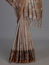 Beige and brown art tusser silk saree with floral bird detailing