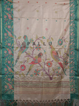 Beige and green art tusser silk saree with elegant bird motifs