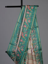 Beige and green art tusser silk saree with elegant bird motifs