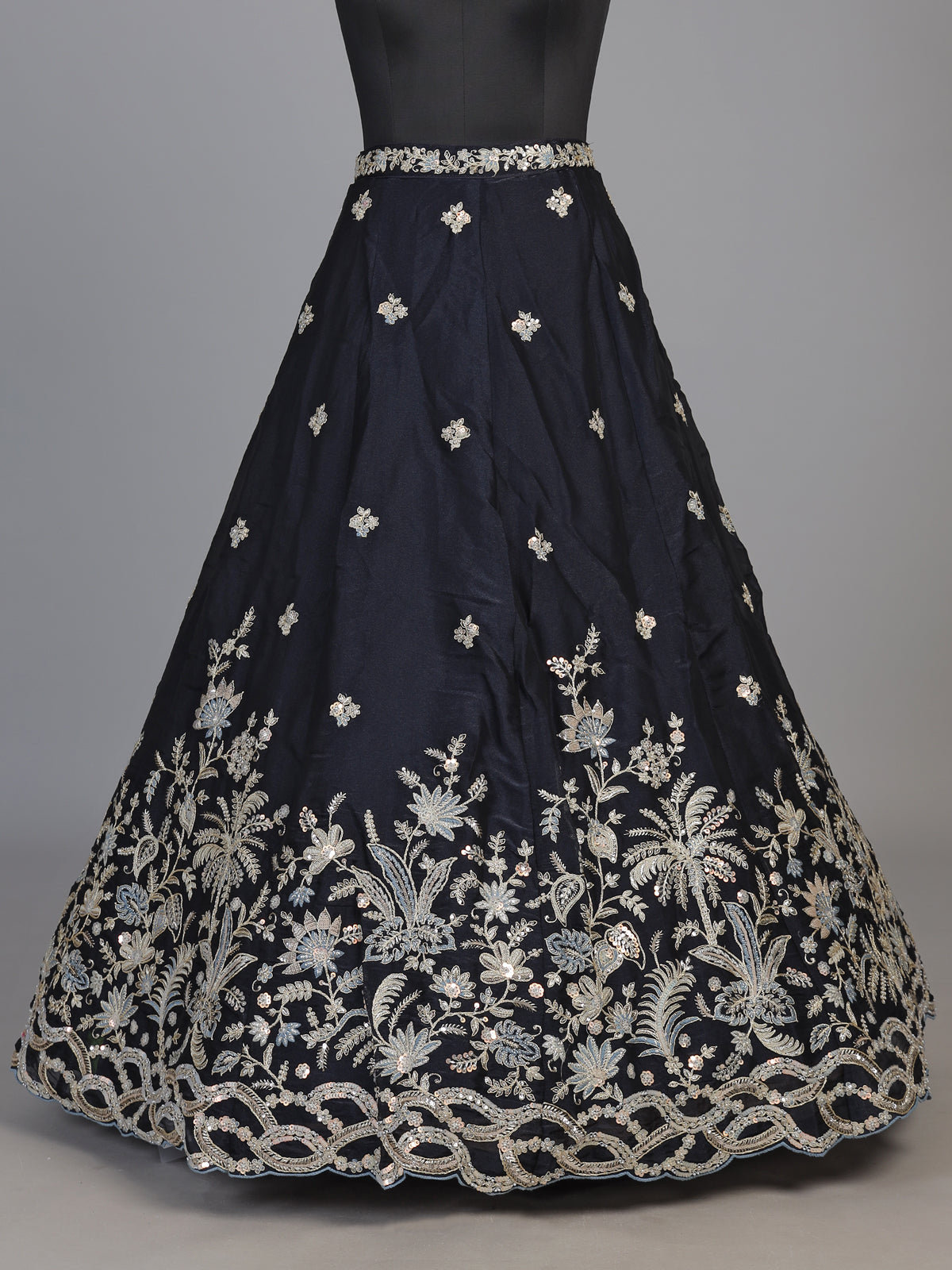 Navy blue silk lehenga choli adorned with floral stonework