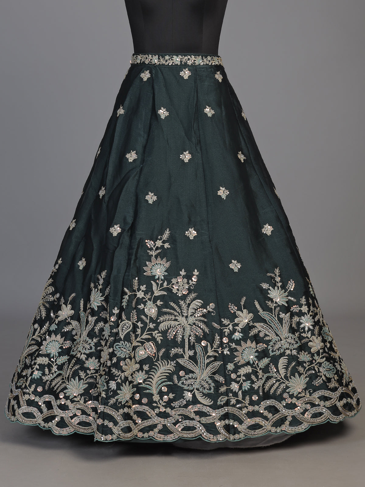 Peacock green silk lehenga choli with floral zardosi embellishments