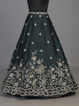 Peacock green silk lehenga choli with floral zardosi embellishments