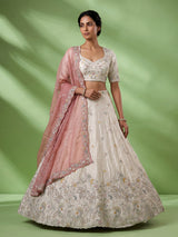 White silk lehenga choli featuring graceful birds and contrast dupatta