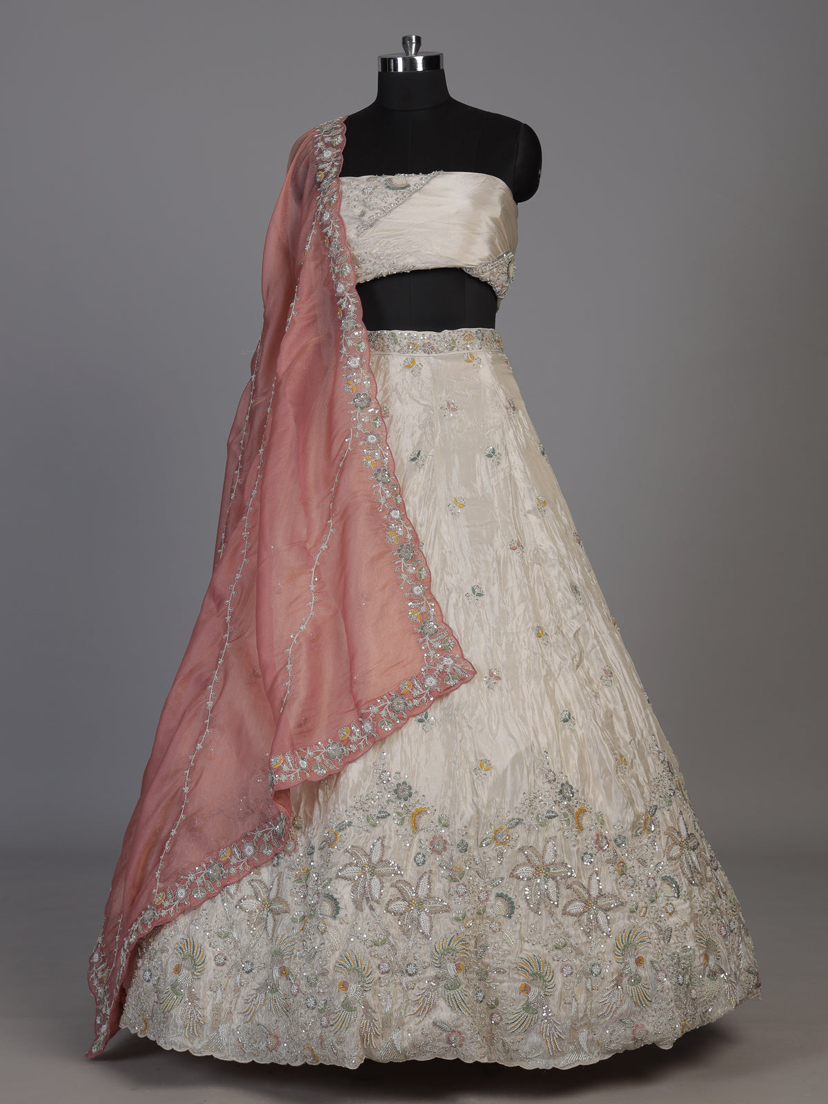 White silk lehenga choli featuring graceful birds and contrast dupatta