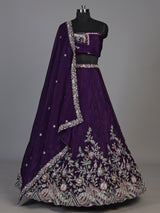 Royal purple silk lehenga choli with intricate festive craftsmanship