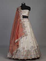 Cream silk lehenga choli decorated with charming animal motifs