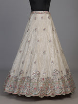 Cream silk lehenga choli decorated with charming animal motifs
