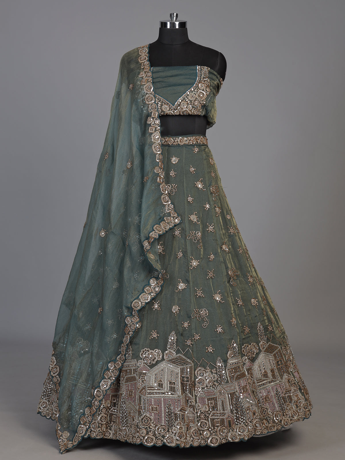 Sage green tissue silk lehenga choli with mirror accents