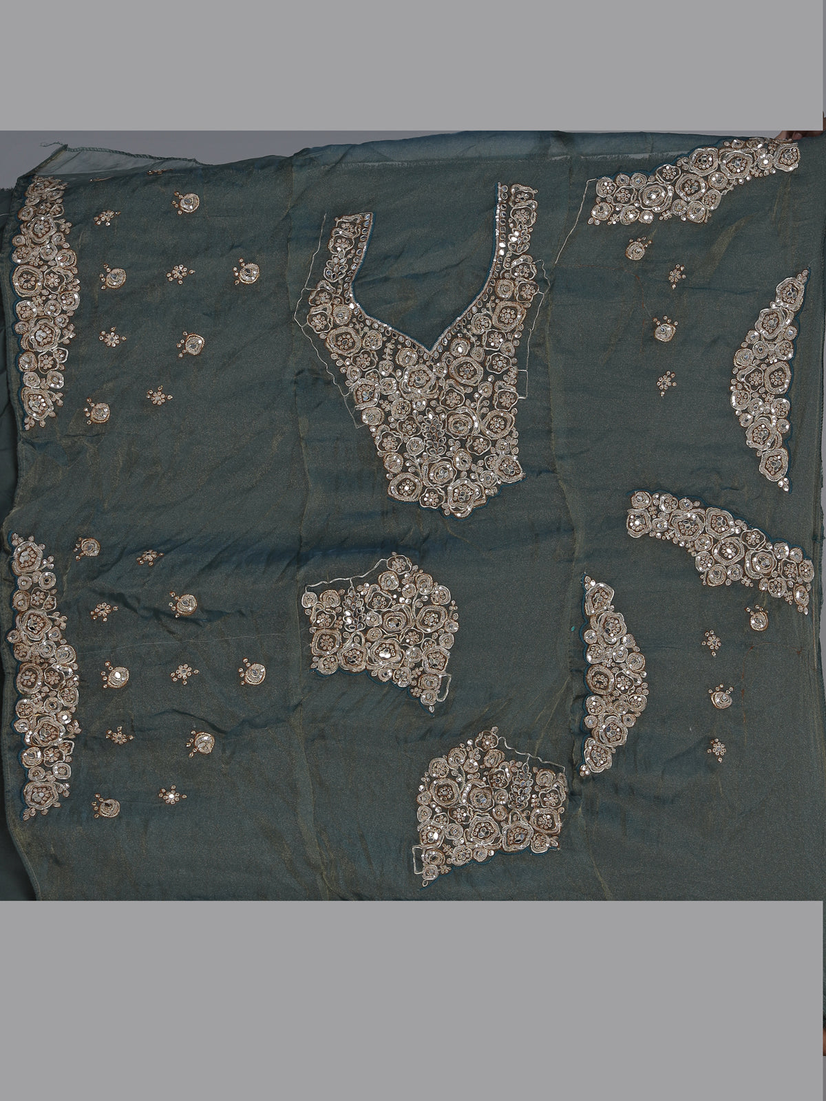 Sage green tissue silk lehenga choli with mirror accents