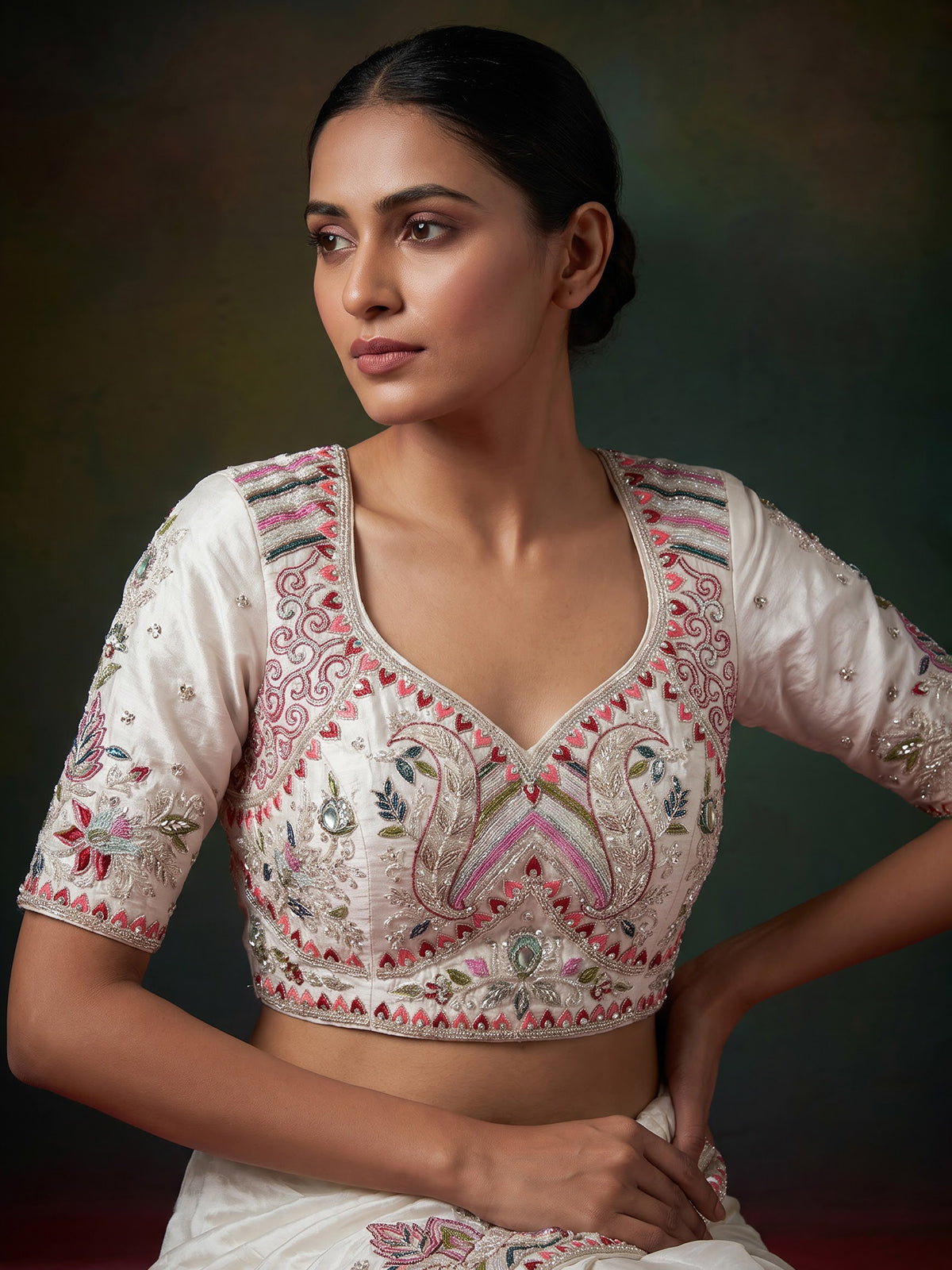 White tissue silk lehenga choli featuring exquisite zardosi embellishments