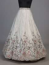 White tissue silk lehenga choli featuring exquisite zardosi embellishments