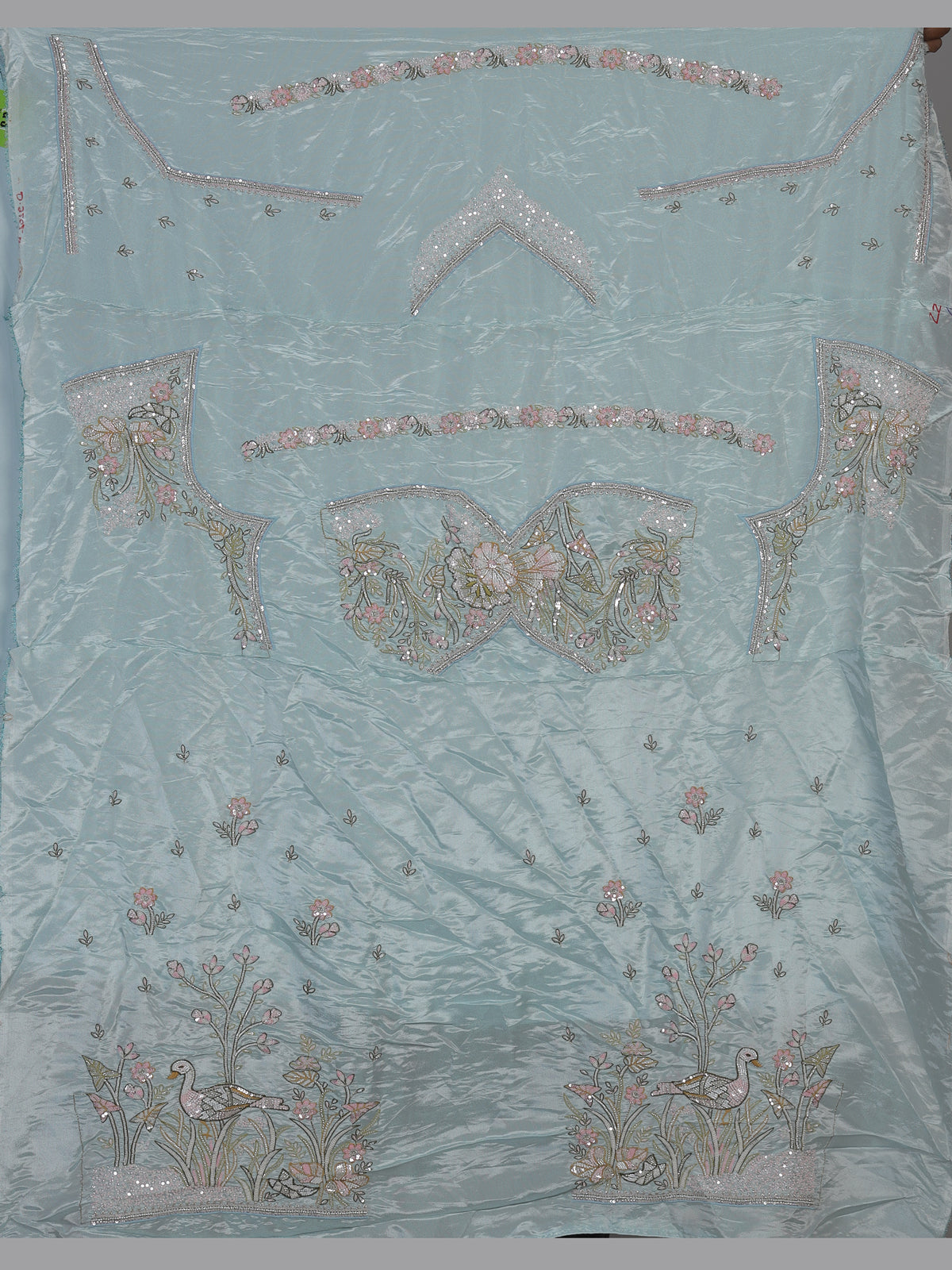 Mint blue tissue silk lehenga choli with enchanting motifs