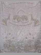 Pink tissue silk lehenga choli adorned with floral bird artistry